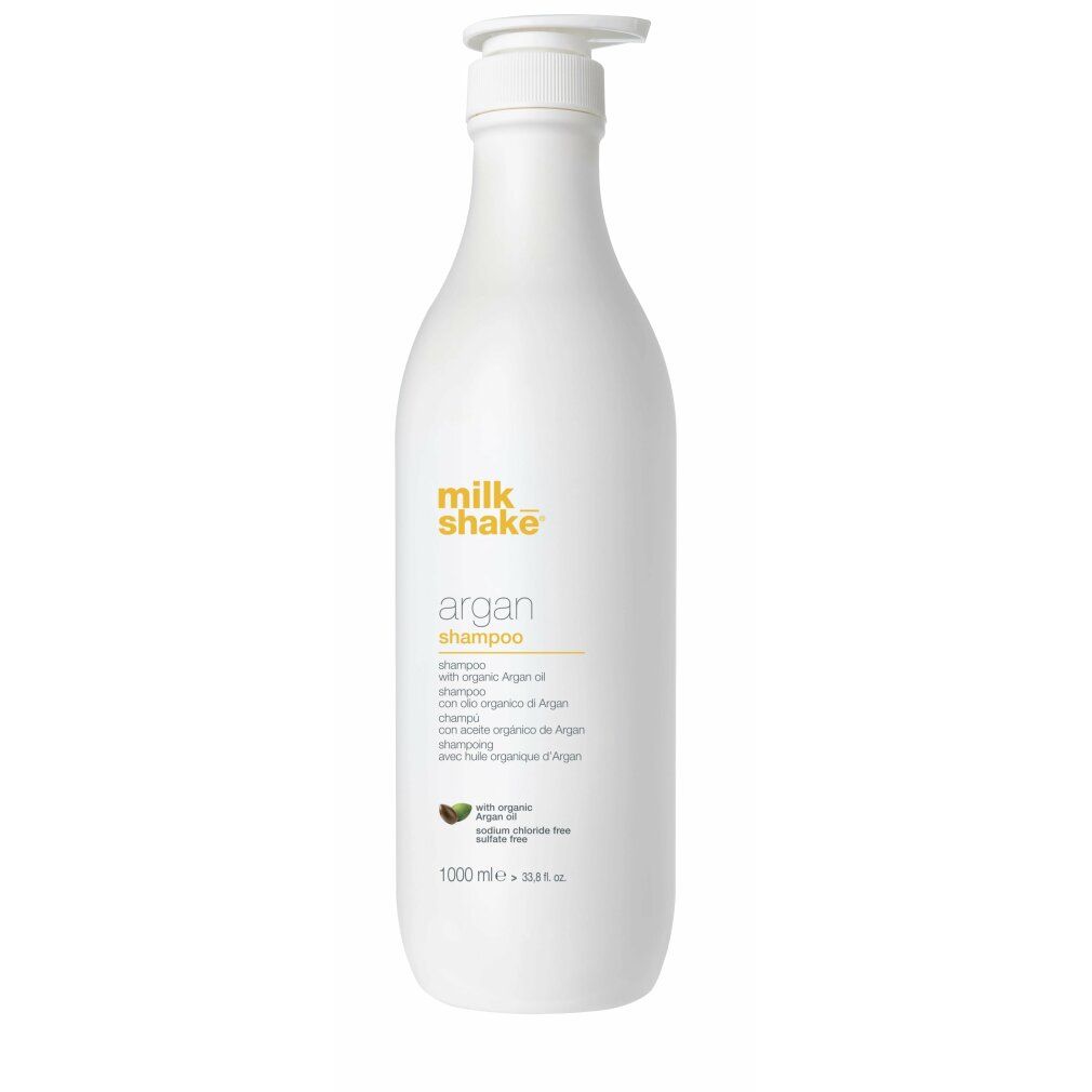 Flacone bianco con etichetta gialla. Scritta: milk_shake argan shampoo. Con olio di argan. 1000 ml.