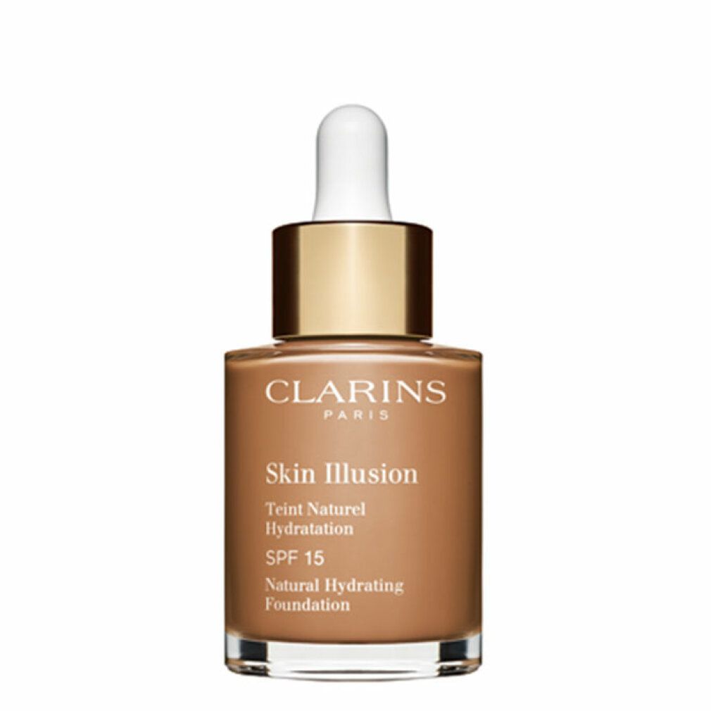 Flacone di fondotinta liquido. Scritta: Skin Illusion, Teint Naturel Hydratation, SPF 15. Marchio: Clarins.