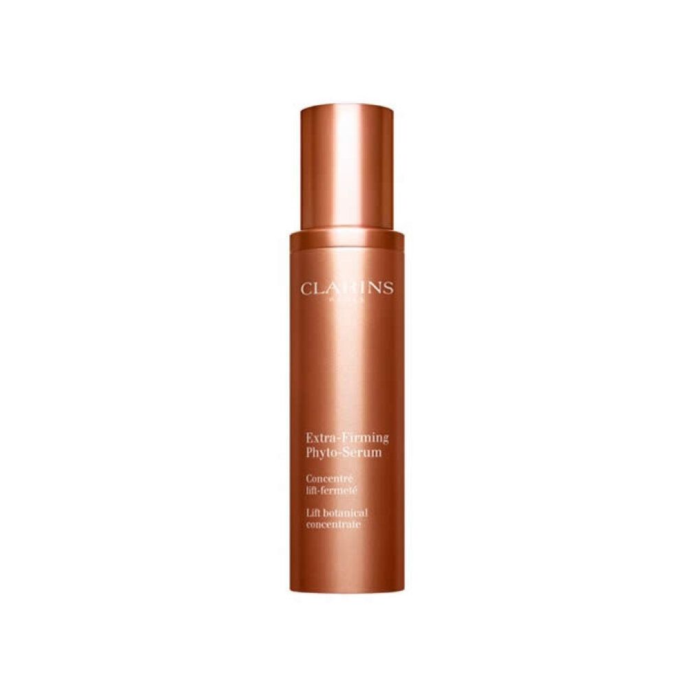 Siero Clarins Extra-Firming Phyto, flacone marrone con dosatore. Nome del prodotto e testo sul flacone.