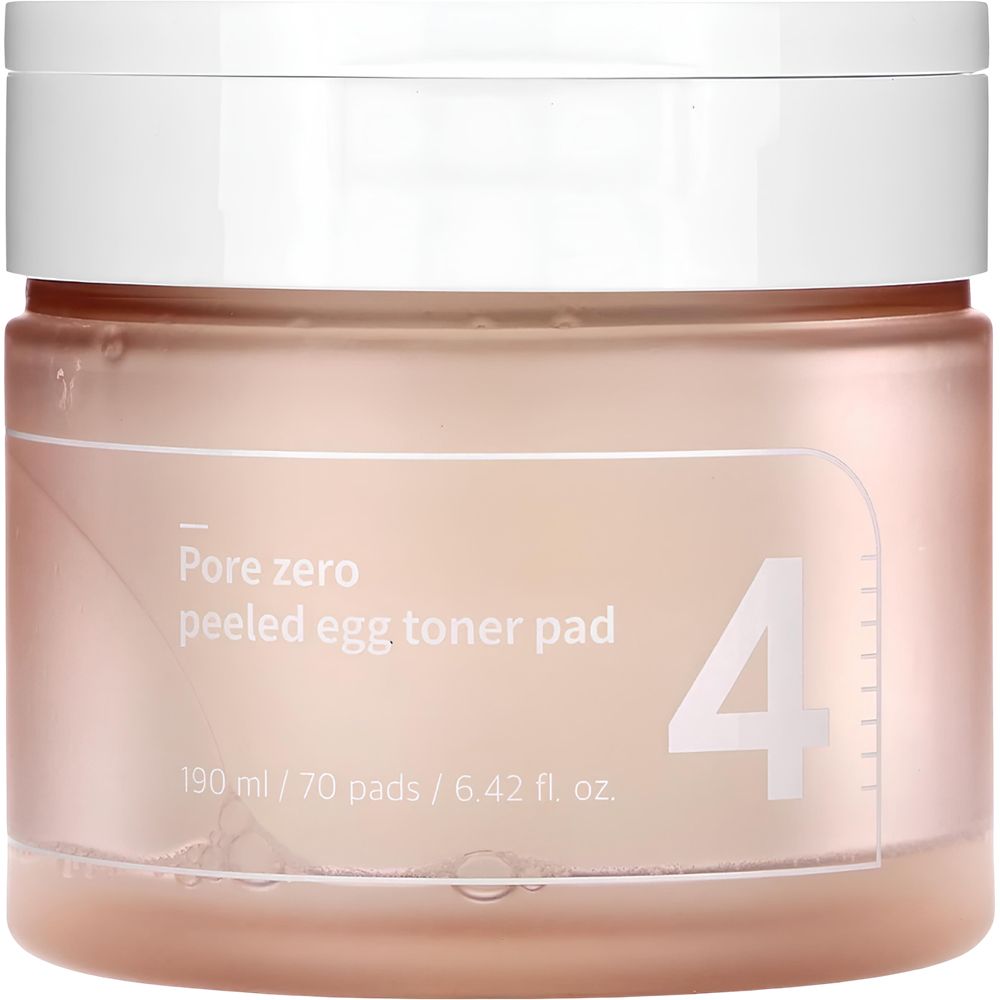 Barattolo rosa con coperchio bianco. Testo: Pore zero peeled egg toner pad. Grande numero 4 bianco. 190 ml / 70 pads / 6.42 fl. oz.