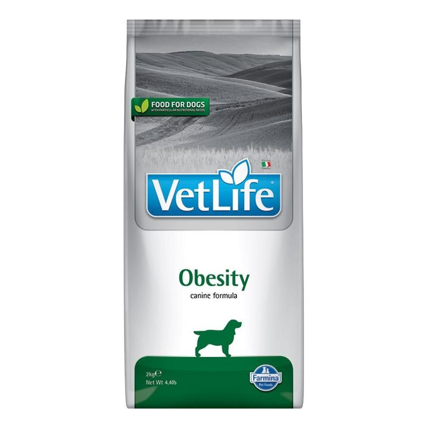 Sacchetto di cibo secco per cani. Scritta 'VetLife Obesity canine formula'. Confezione verde e bianca con logo e sagoma di cane.