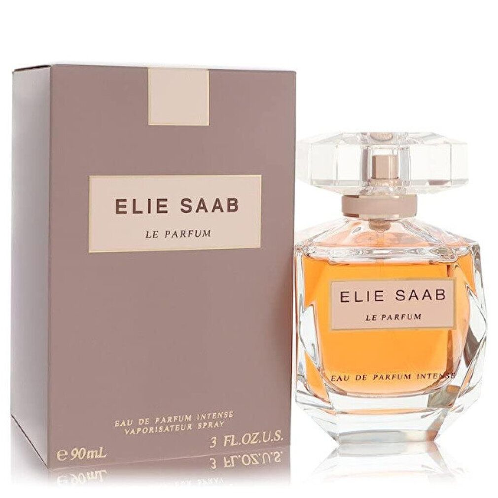 Confezione e flacone di profumo. Flacone con ELIE SAAB LE PARFUM. Scritta. Flacone con liquido dorato.