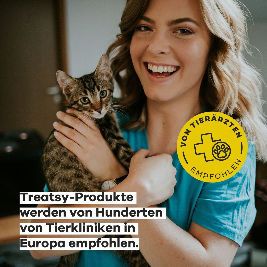 Donna con gatto, sigillo giallo "Consigliato dai veterinari". Testo: prodotti Treatsy raccomandati.