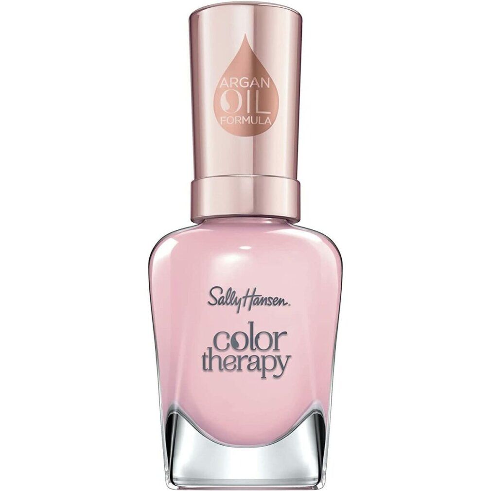 Flacone di smalto rosa chiaro. Scritta: Sally Hansen Color Therapy. Tappo con logo formula all'olio di argan.