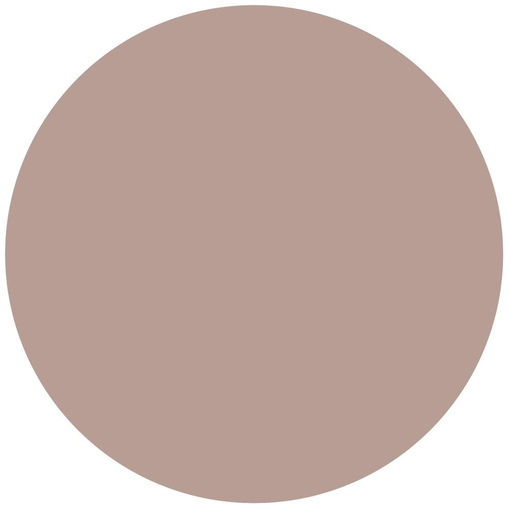 Un cerchio di colore in una tonalità rosa-marrone chiaro.