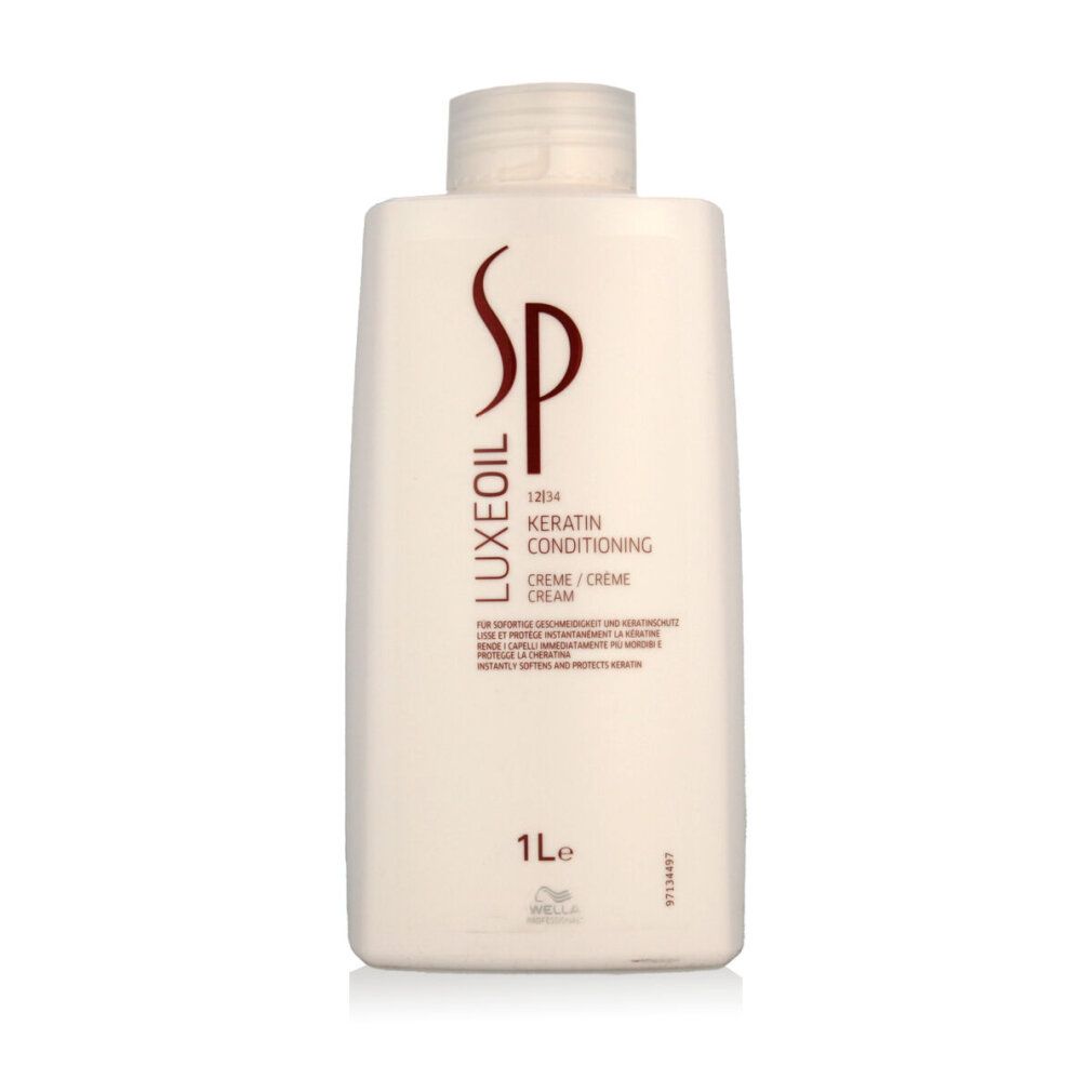 Flacone bianco con logo e testo rosso. Testo: Luxeoil Keratin Conditioning Creme. 1L.