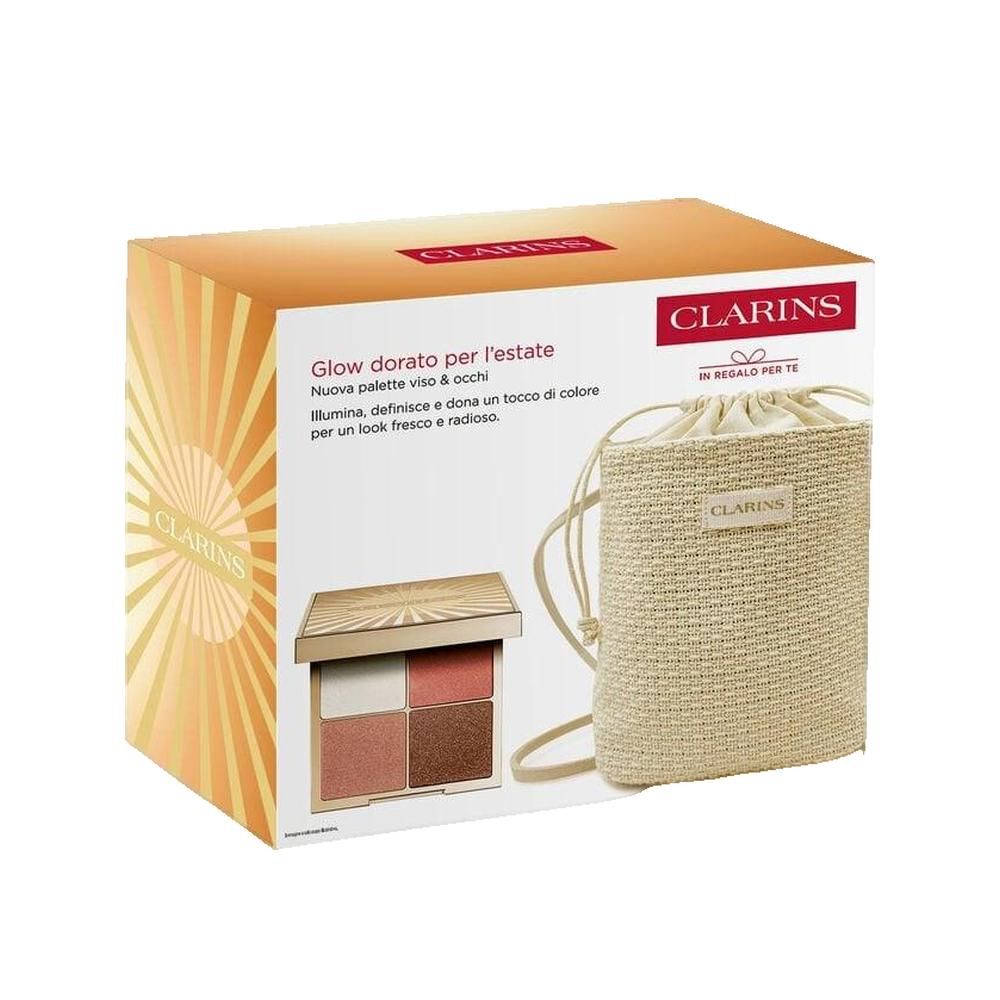 Palette trucco quattro colori, pochette e confezione. Marchio Clarins. Testo: Glow dorato per l'estate.