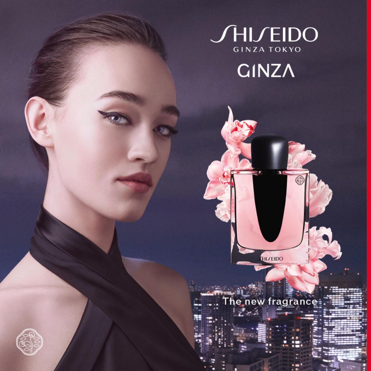 Donna con flacone e fiori. Testo: "SHISEIDO GINZA TOKYO GINZA". Sotto: "The new fragrance".