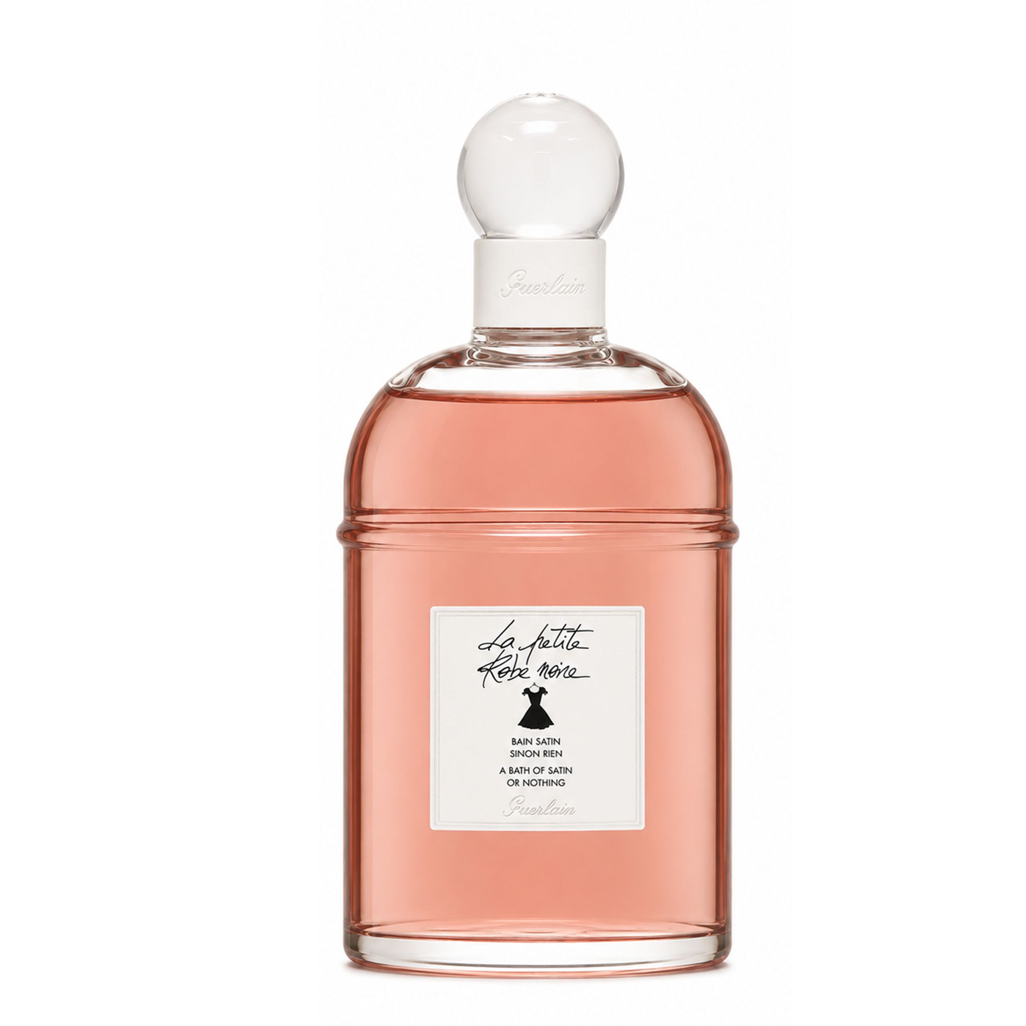 Guerlain La Petite Robe Noire bagnoschiuma in flacone di vetro trasparente con etichetta bianca.