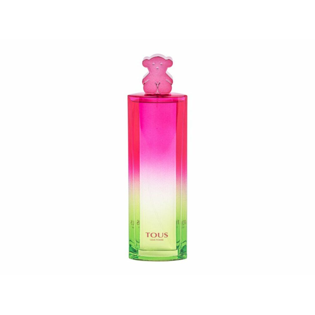 Flacone di profumo alto con sfumatura rosa-verde. Tappo orso rosa. Scritta: TOUS GEMS POWER.