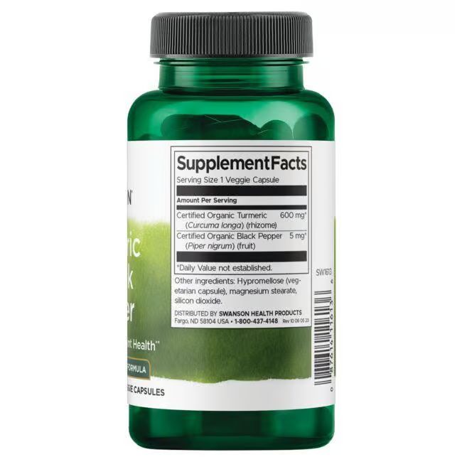 Retro di un flacone verde. Etichetta bianca con informazioni nutrizionali. Ingredienti: curcuma, pepe nero.