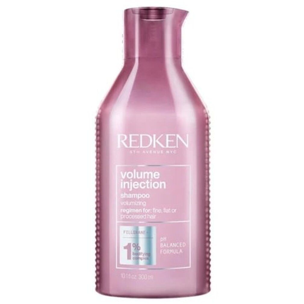 Flacone di shampoo rosa con testo bianco. Marchio: Redken. Nome prodotto: Volume Injection Shampoo. Formula pH bilanciata.
