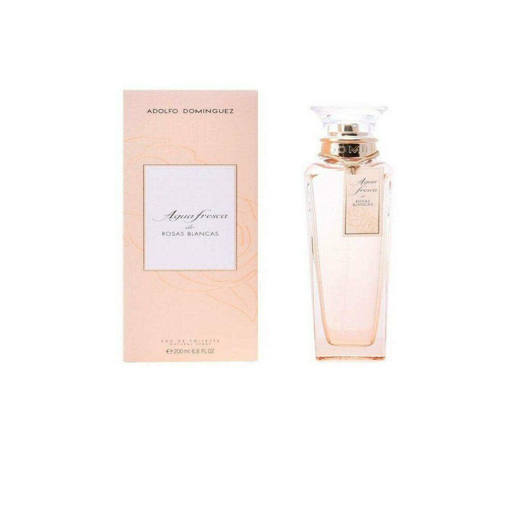 Flacone di profumo e confezione rosa. Flacone con tappo trasparente, liquido rosa. Confezione con testo: Agua fresca de Rosas Blancas.