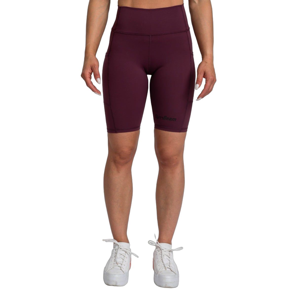 Pantaloncini da ciclista da donna viola scuro, vita alta, tasche, vista laterale.