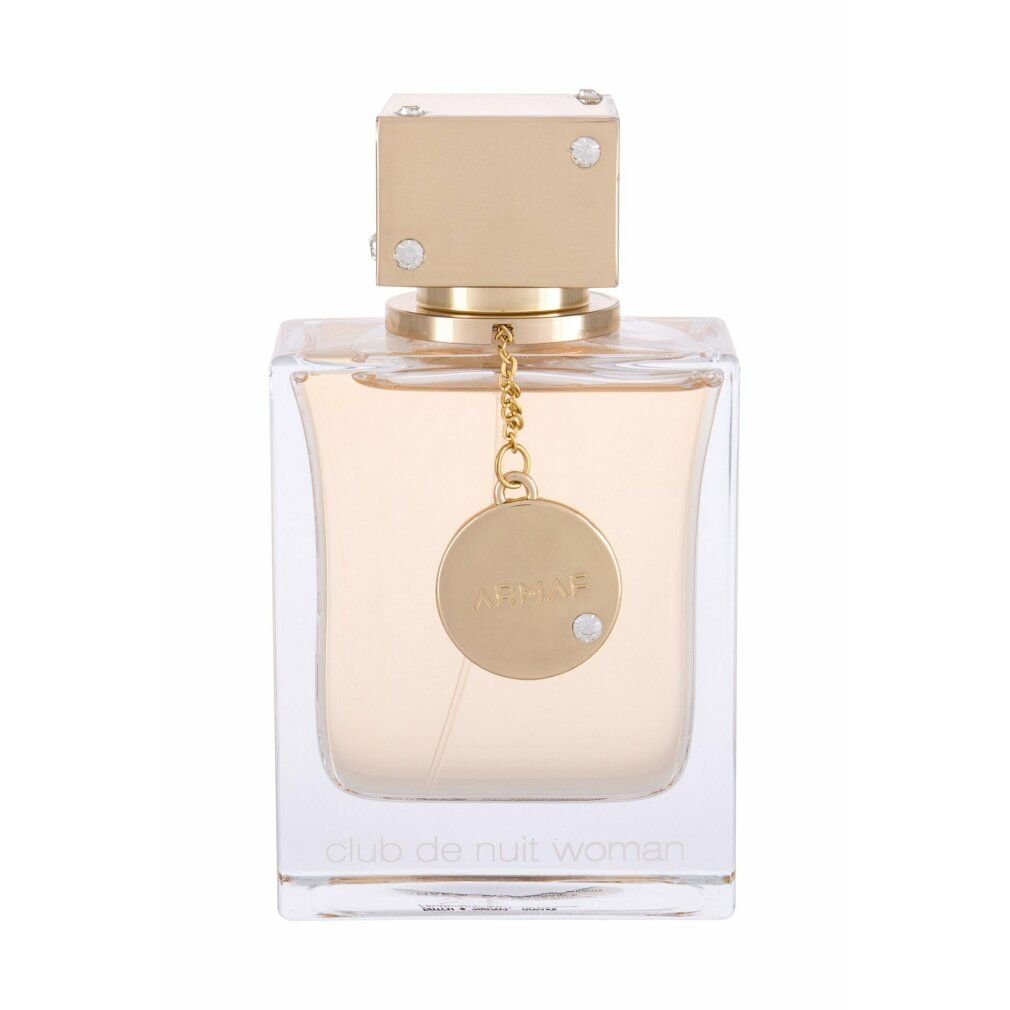 Flacone di profumo quadrato, con tappo e pendente dorati. Flacone in vetro trasparente con dettagli dorati.