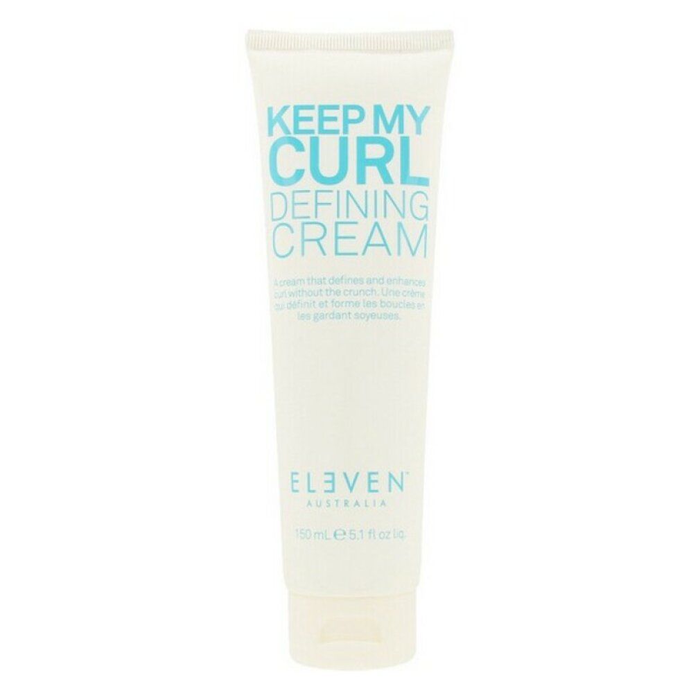 Tubo di crema Keep My Curl Defining Cream. Marchio Eleven Australia. Testo azzurro chiaro su sfondo bianco. Confezione del prodotto.