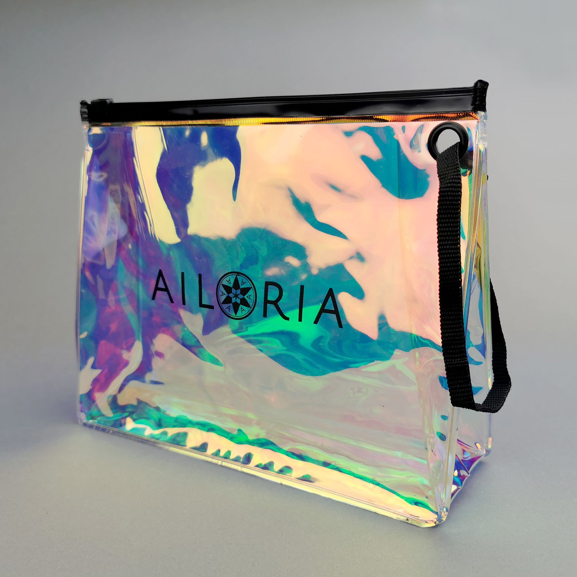 Borsa trasparente con logo AILORIA e manico. Effetto olografico.