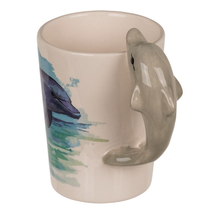 Tazza con manico a forma di delfino e motivo delfino. Il manico è un delfino grigio. Marchio: Out of the blue.