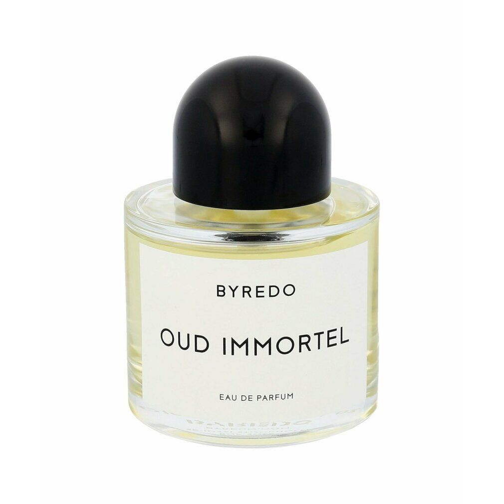 Flacone rotondo in vetro con tappo nero. Etichetta con "BYREDO OUD IMMORTEL" e "EAU DE PARFUM".