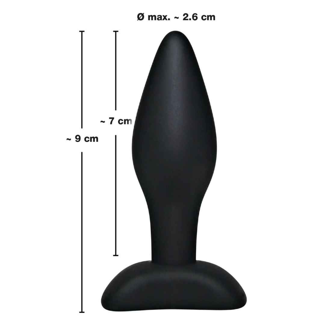 Plug anale nero, punta stretta. Dimensioni: circa 9 cm di lunghezza, Ø max. 2,6 cm. In silicone.