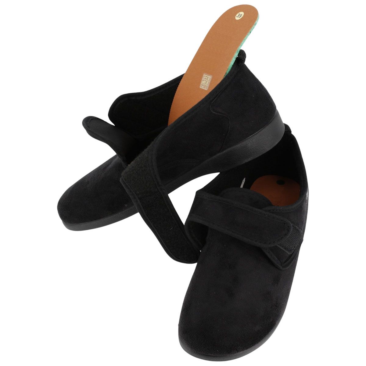 Scarpa nera con soletta estraibile. Chiusura a strappo. Morbido velluto.