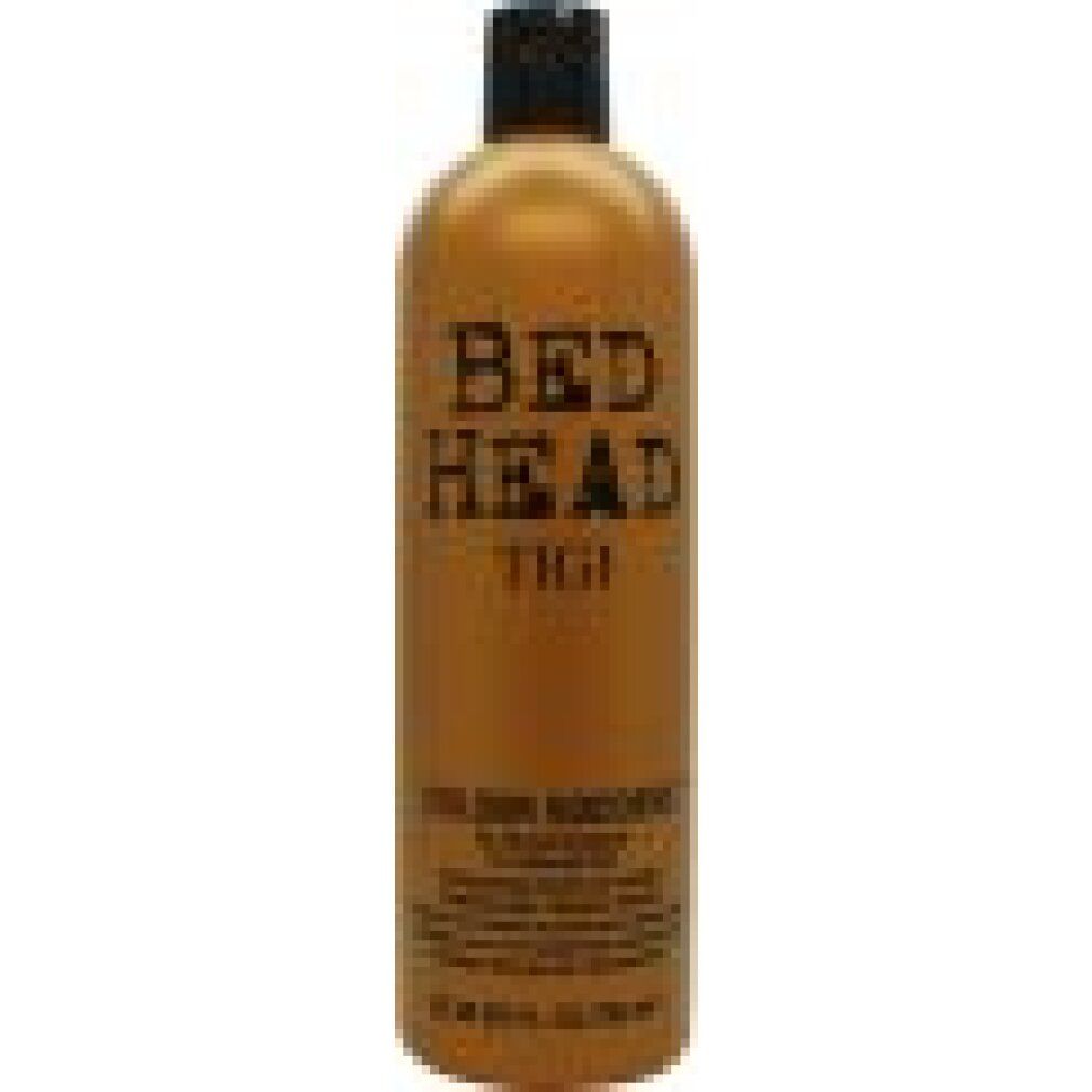 Flacone dorato con tappo nero. Scritta: Bed Head TIGI Colour Goddess. Nome del prodotto e testo in nero.