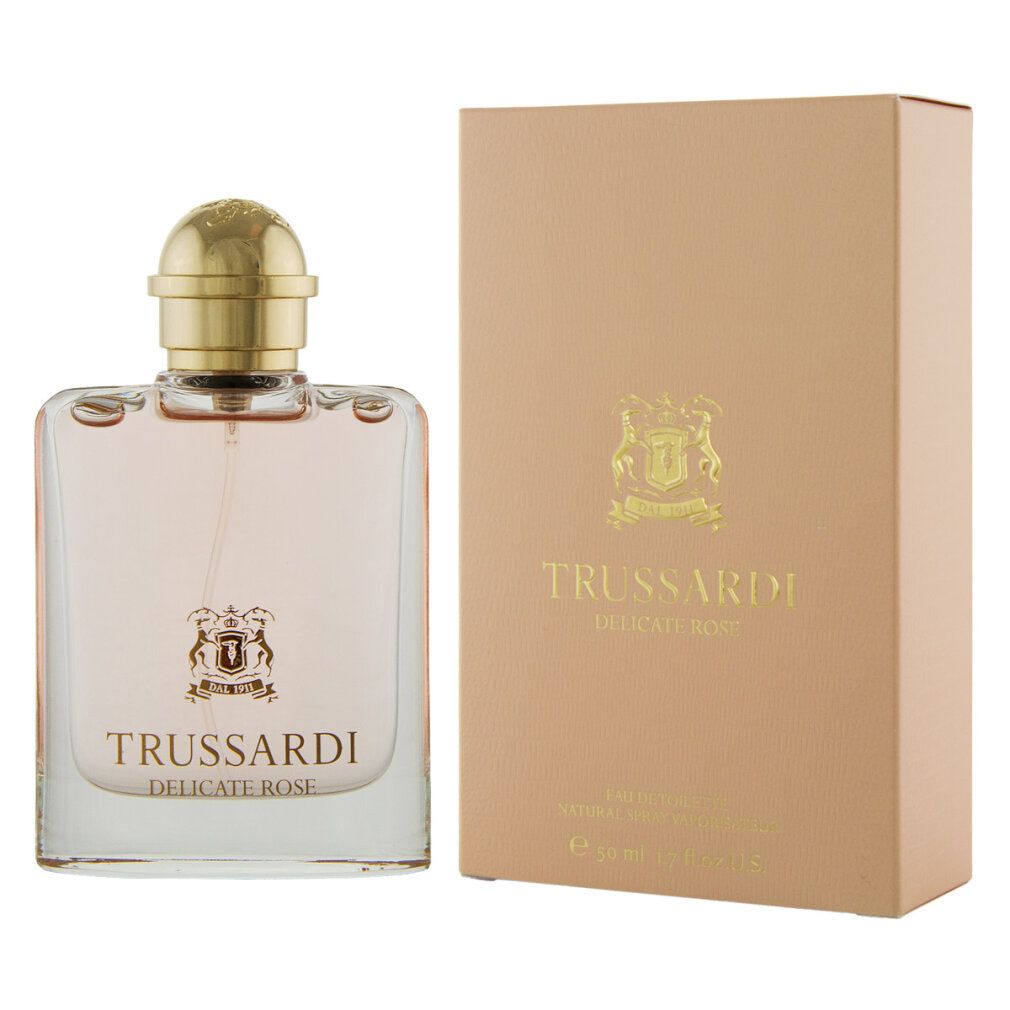 Flacone in vetro e confezione in cartone. Flacone con liquido rosa, tappo dorato. Scritta TRUSSARDI DELICATE ROSE.