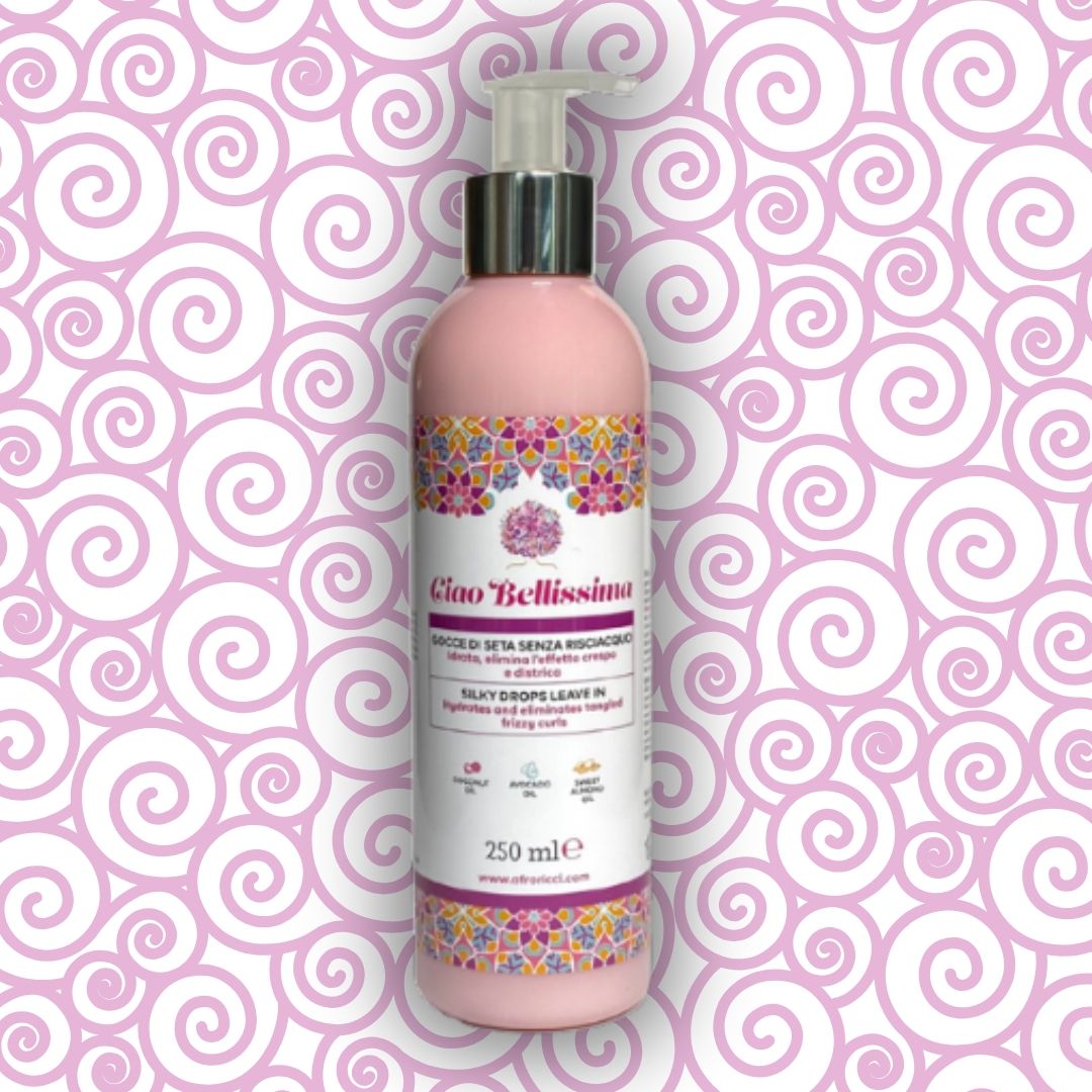 Flacone rosa con dosatore. Scritta: Ciao Bellissima, Gocce di seta senza risciacquo. 250 ml.