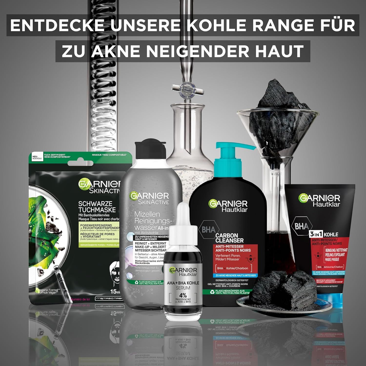 Vari prodotti Garnier Hautklar. Maschera nera, acqua micellare, siero, gel detergente, carbone. Scritta: Garnier.