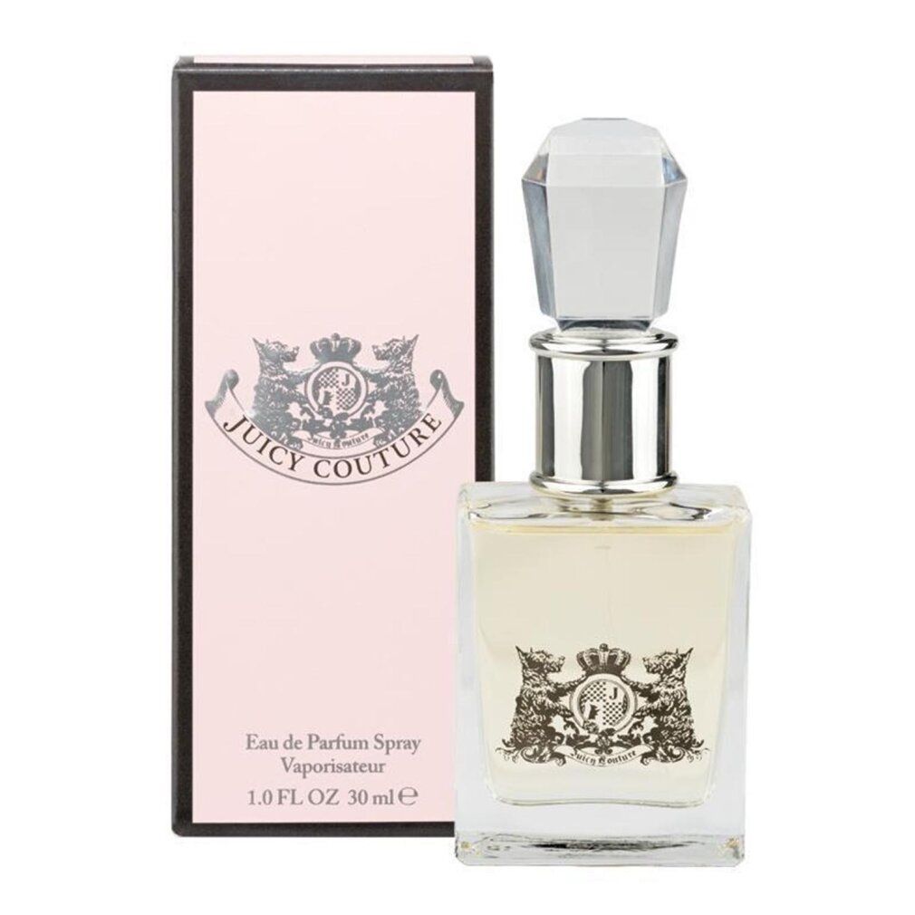 Flacone di profumo e confezione rosa. Flacone con tappo argento. Scritta Juicy Couture.