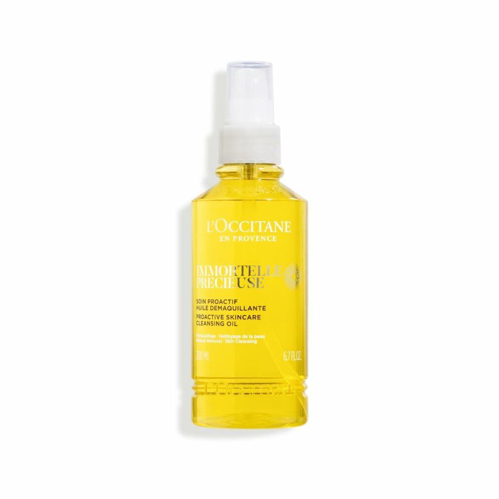 Flacone giallo con vaporizzatore. Scritta: Immortelle Précieuse, olio detergente. Marchio L'Occitane en Provence.