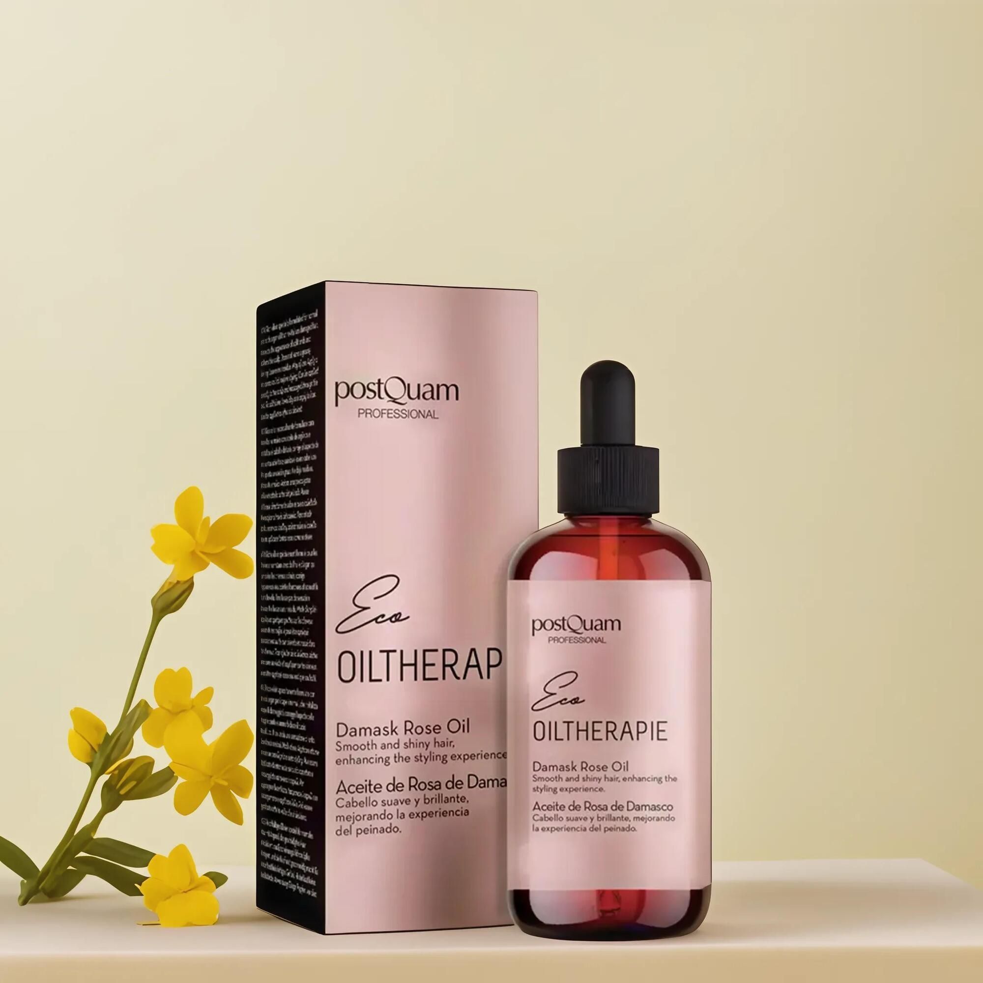Flacone di vetro marrone con contagocce ed etichetta rosa. Accanto, confezione rosa con testo e fiori gialli. Nome del prodotto: Olio di rosa damascena.