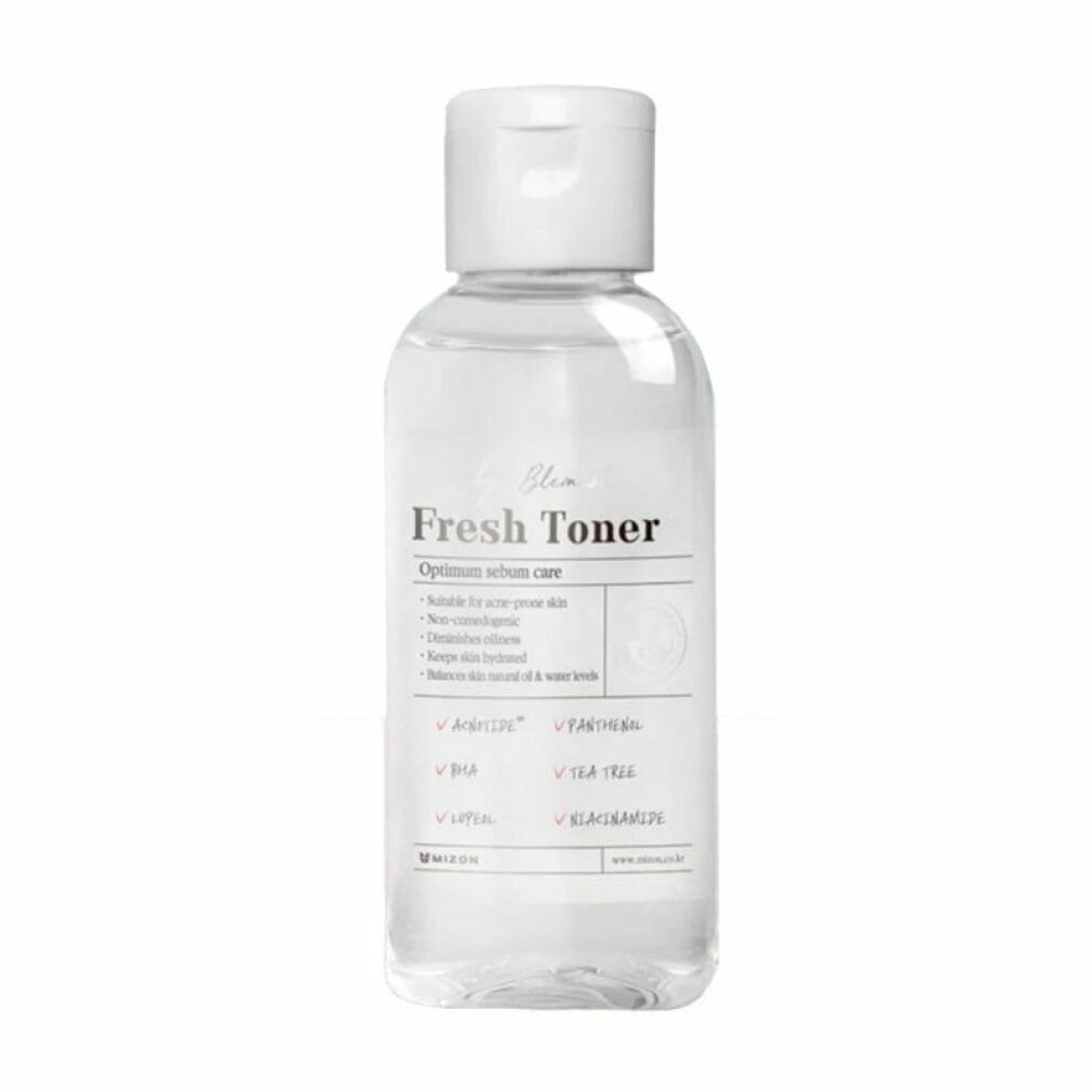Flacone trasparente con tappo bianco. Scritta: Fresh Toner. Contiene ingredienti come Acnotide, BHA, Tea Tree.