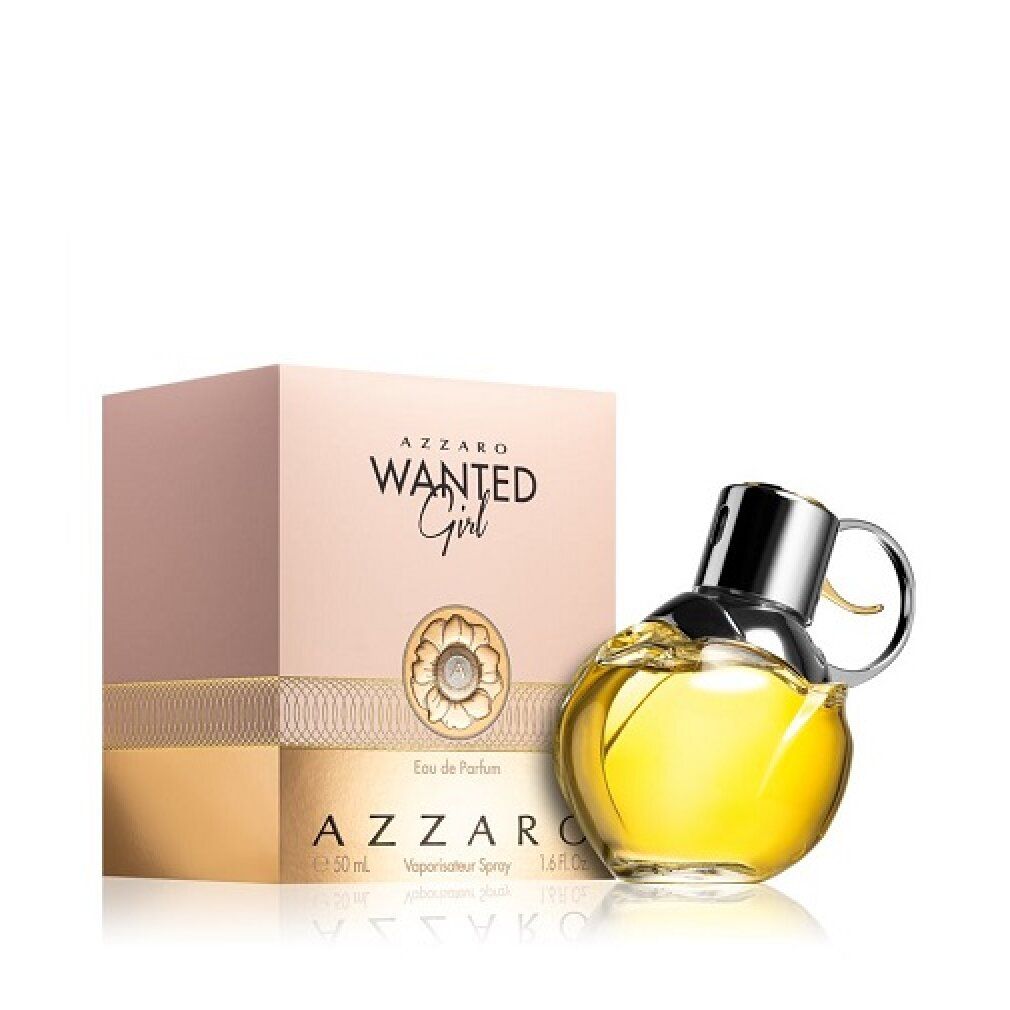 Flacone di profumo e confezione. Flacone a forma di cuore, tappo argentato. Confezione rosa con scritta 'Wanted Girl'.