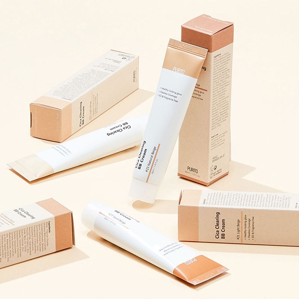 Diversi tubi e scatole di BB Cream. Corpo bianco, tappo marrone. Scritte: Purito, Cica Clearing BB Cream.