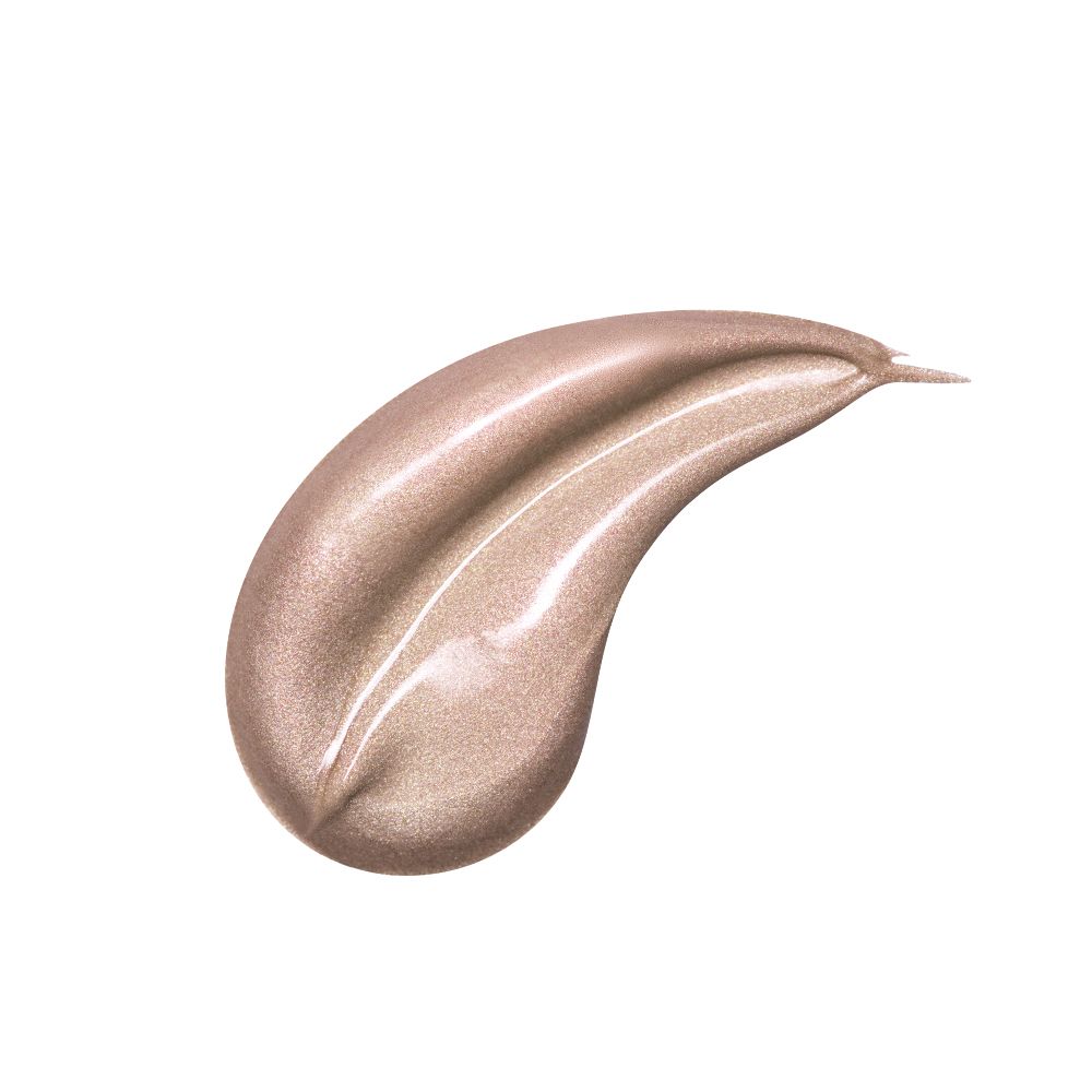 Macchia di illuminante liquido. Colore beige-oro brillante.