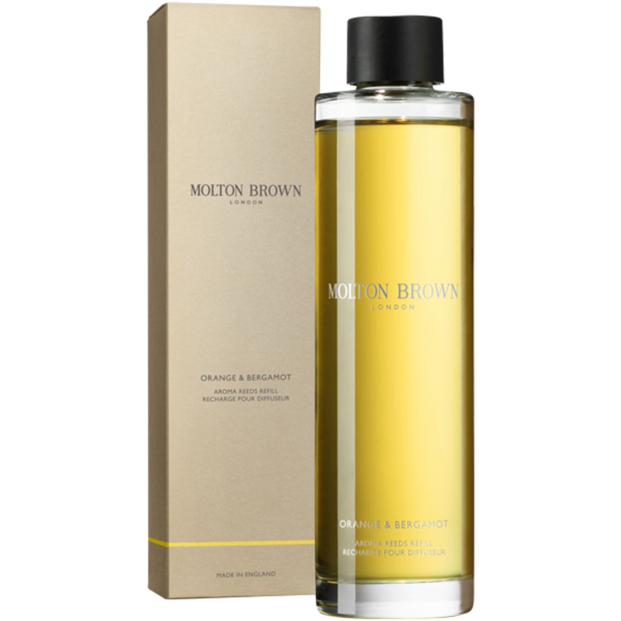 Ricarica Molton Brown Orange & Bergamot con confezione. Bottiglia e scatola. Testo: Orange & Bergamot, Molton Brown London.