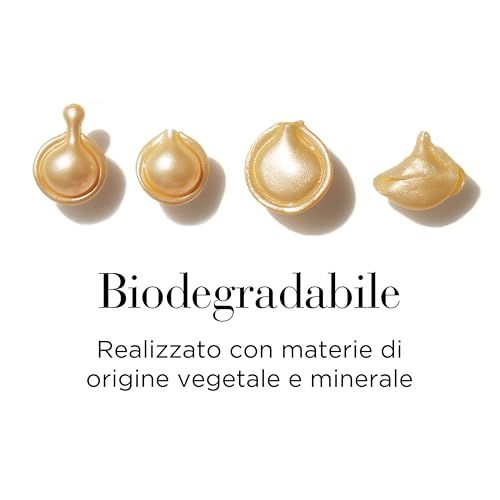 Quattro capsule dorate. Testo: Biodegradabile. Realizzato con materiali vegetali e minerali.