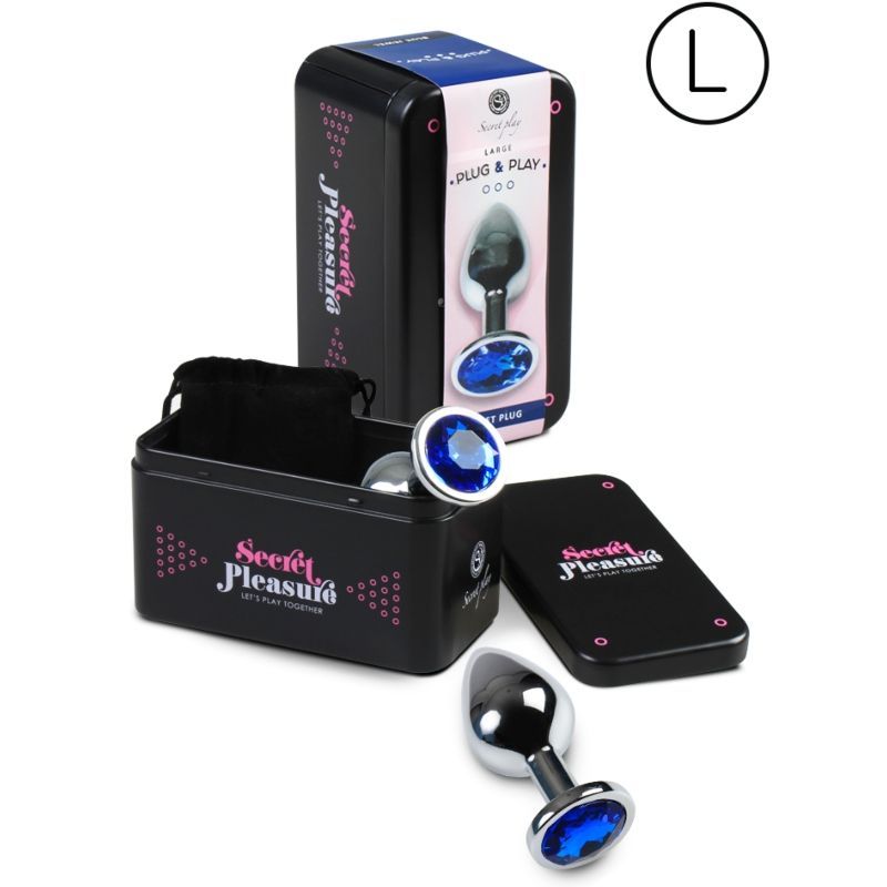 Plug anale in scatola nera. Scatola con immagine del prodotto e scritta. Sacchetto nero e coperchio accanto.