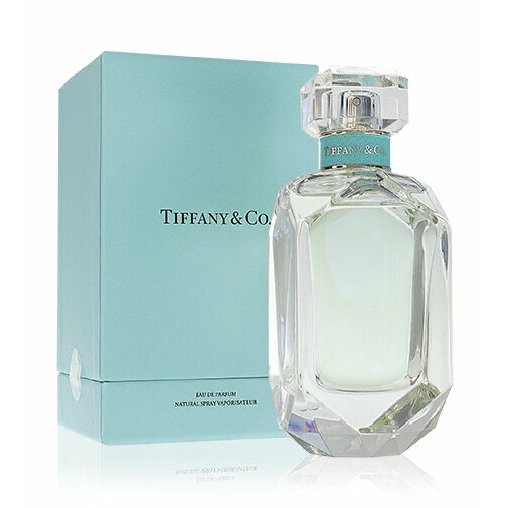 Flacone e scatola. Flacone in vetro, ottagonale, con tappo. Scatola turchese con scritta. Scritta: Tiffany & Co.