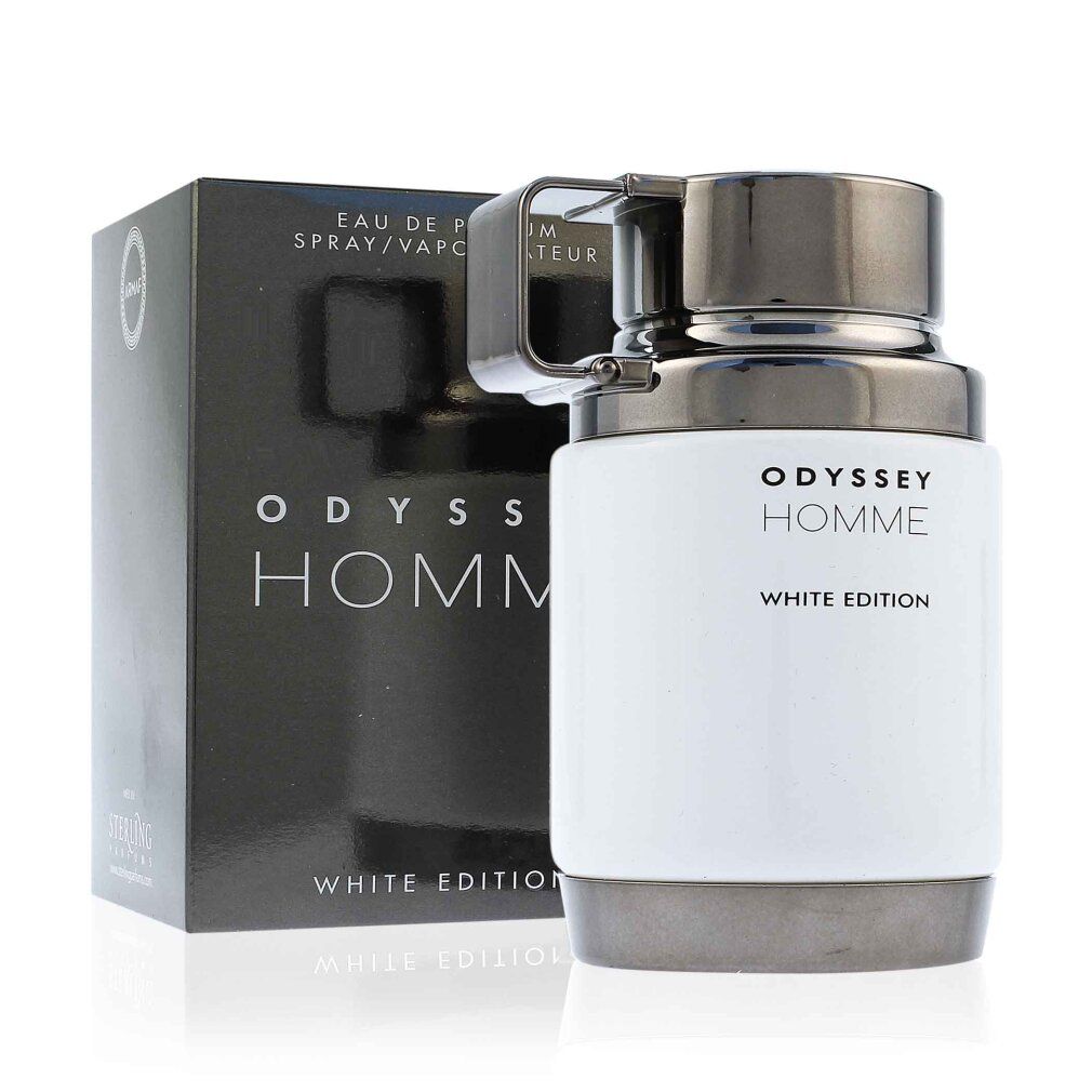 Flacone bianco con tappo e manico neri, accanto a una scatola nera. Scritta: Odyssey Homme White Edition. Eau de Parfum Spray.