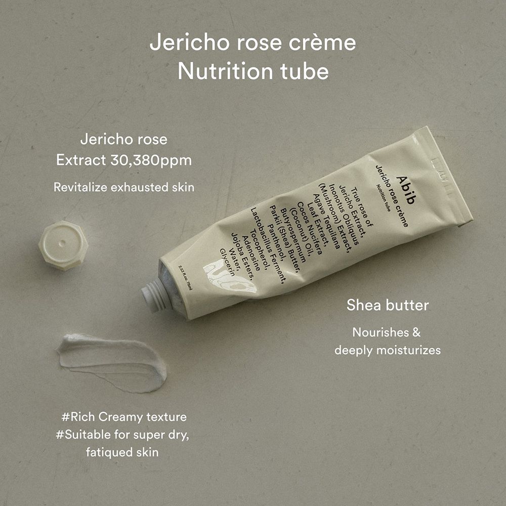 Tubo crema aperto con filo di crema. Scritta: Abib Jericho rose crème. Testo: Shea butter. Sfondo bianco.
