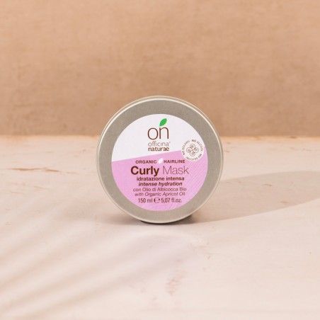Barattolo rotondo con etichetta. Scritta: Curly Mask, intense hydration. Logo: Officina Naturae. Contenuto: 150 ml.
