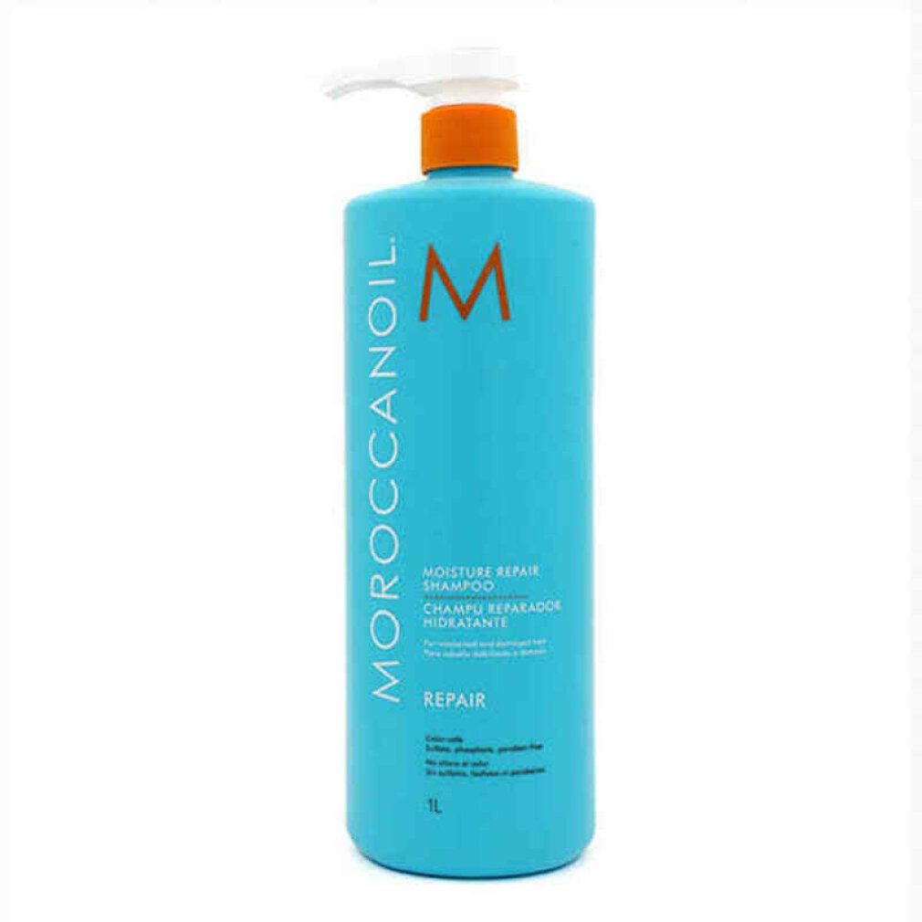 Flacone di shampoo turchese con dosatore bianco. Scritta: Moroccanoil, Moisture Repair Shampoo, Repair. Logo arancione.
