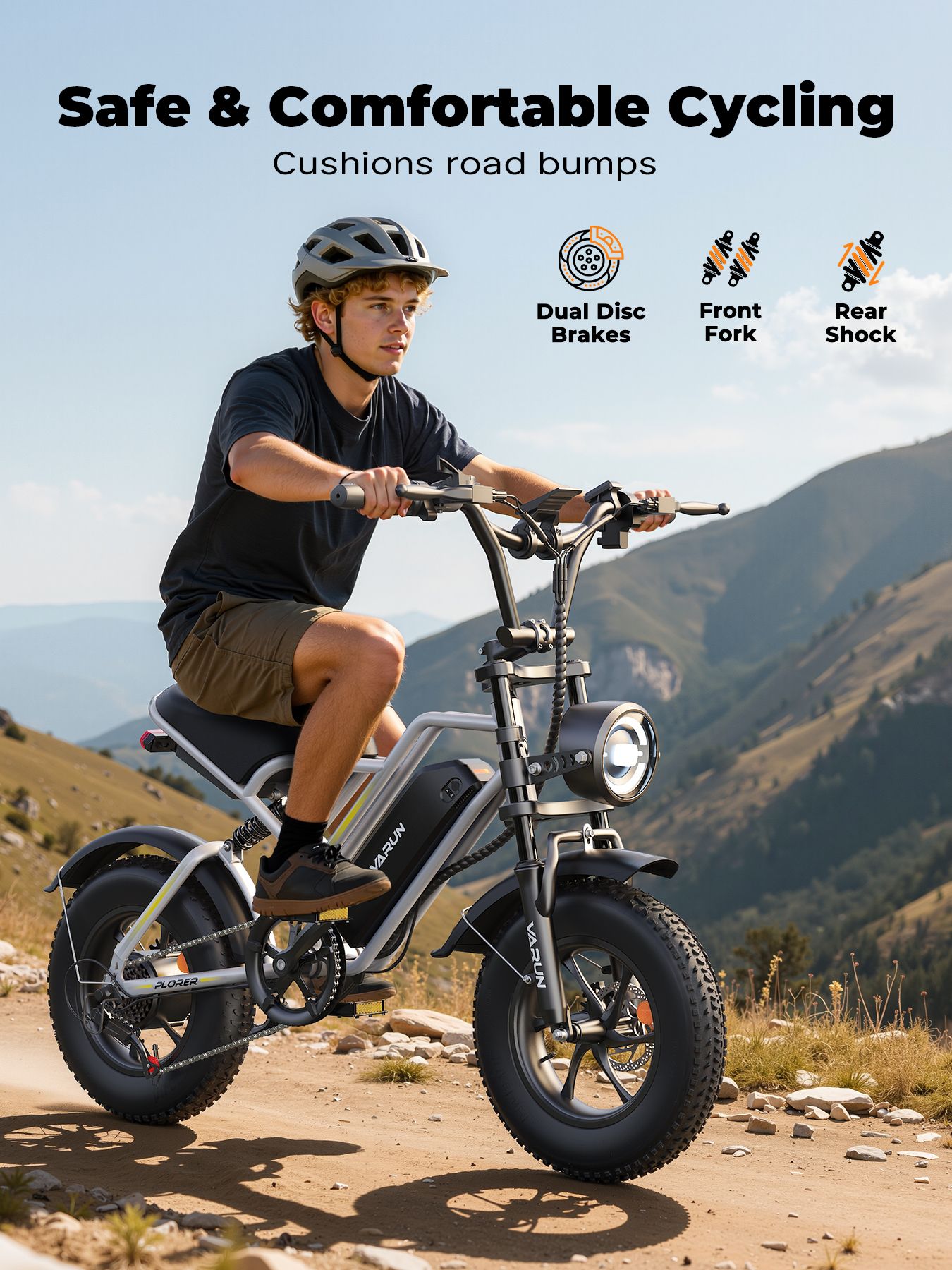 Persona in bicicletta elettrica. Testo: Safe & Comfortable Cycling, Dual Disc Brakes, Front Fork, Rear Shock.