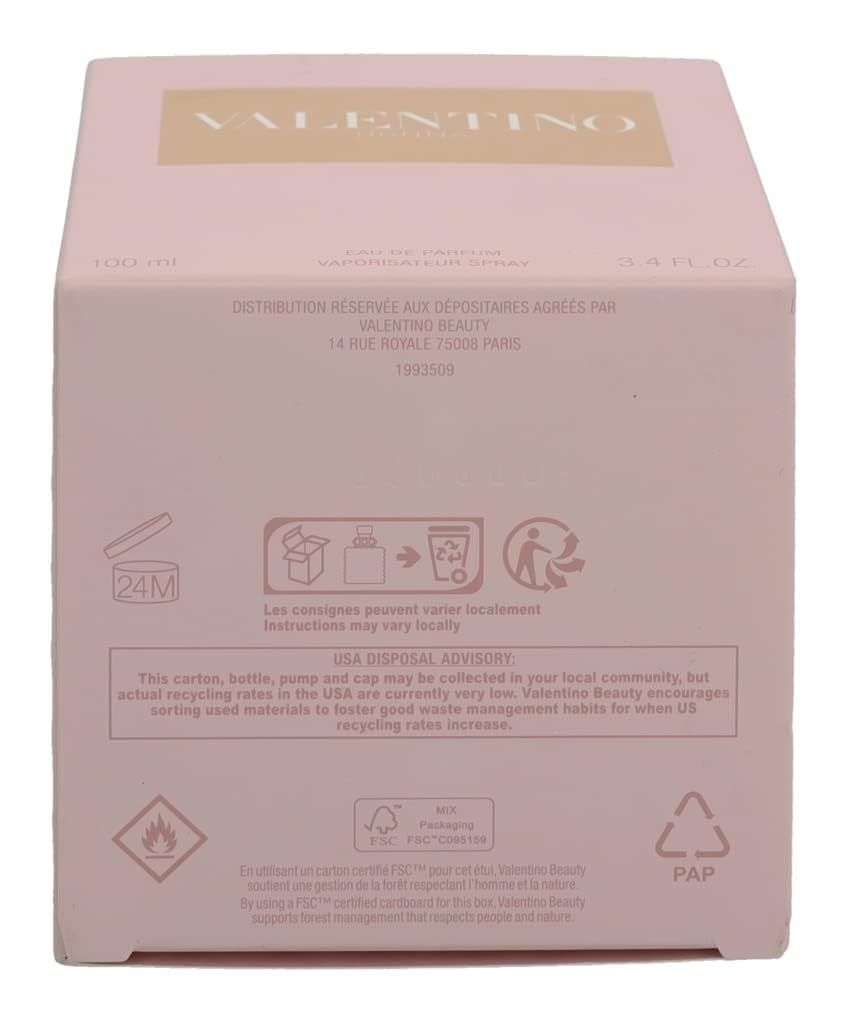 Confezione in cartone rosa con testo e loghi. Contiene informazioni su ingredienti, smaltimento e certificazioni.