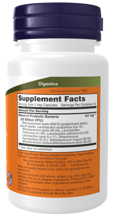 Etichetta dei fatti sugli integratori. Contiene una miscela di batteri probiotici. Bottiglia bianca con tappo blu. Etichetta arancione con testo.