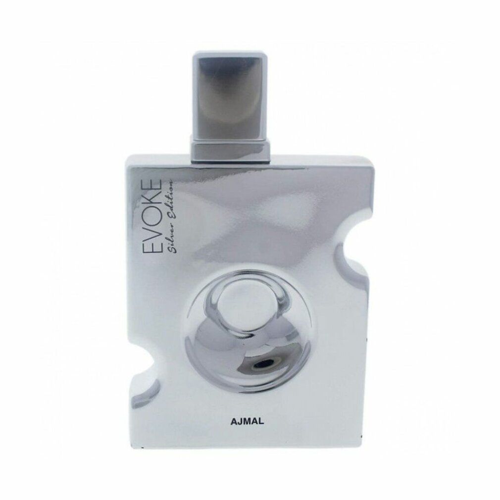 Flacone argentato con scritta 'EVOKE Silver Edition' e 'AJMAL'. Forma quadrata con angoli arrotondati e tappo argentato.