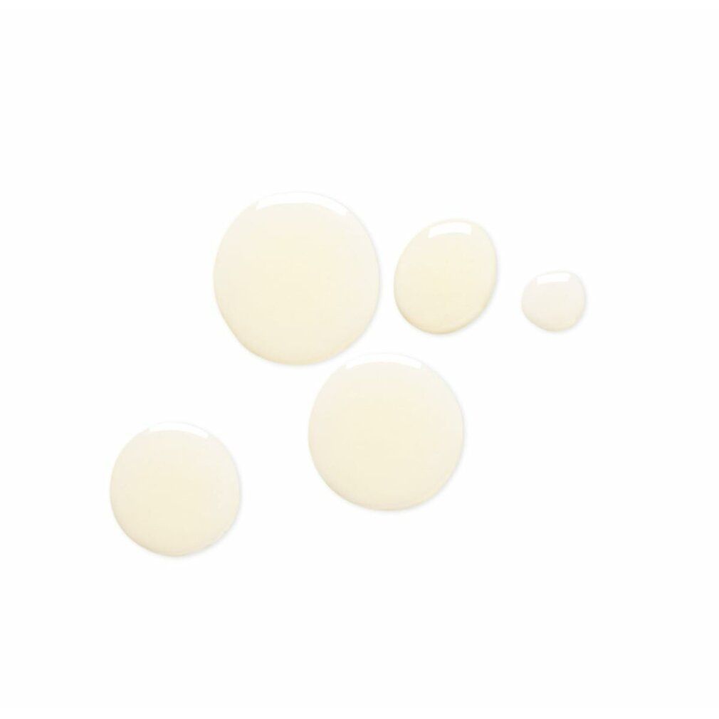 Cinque gocce d'olio su sfondo bianco. Forma rotonda, colore giallastro.