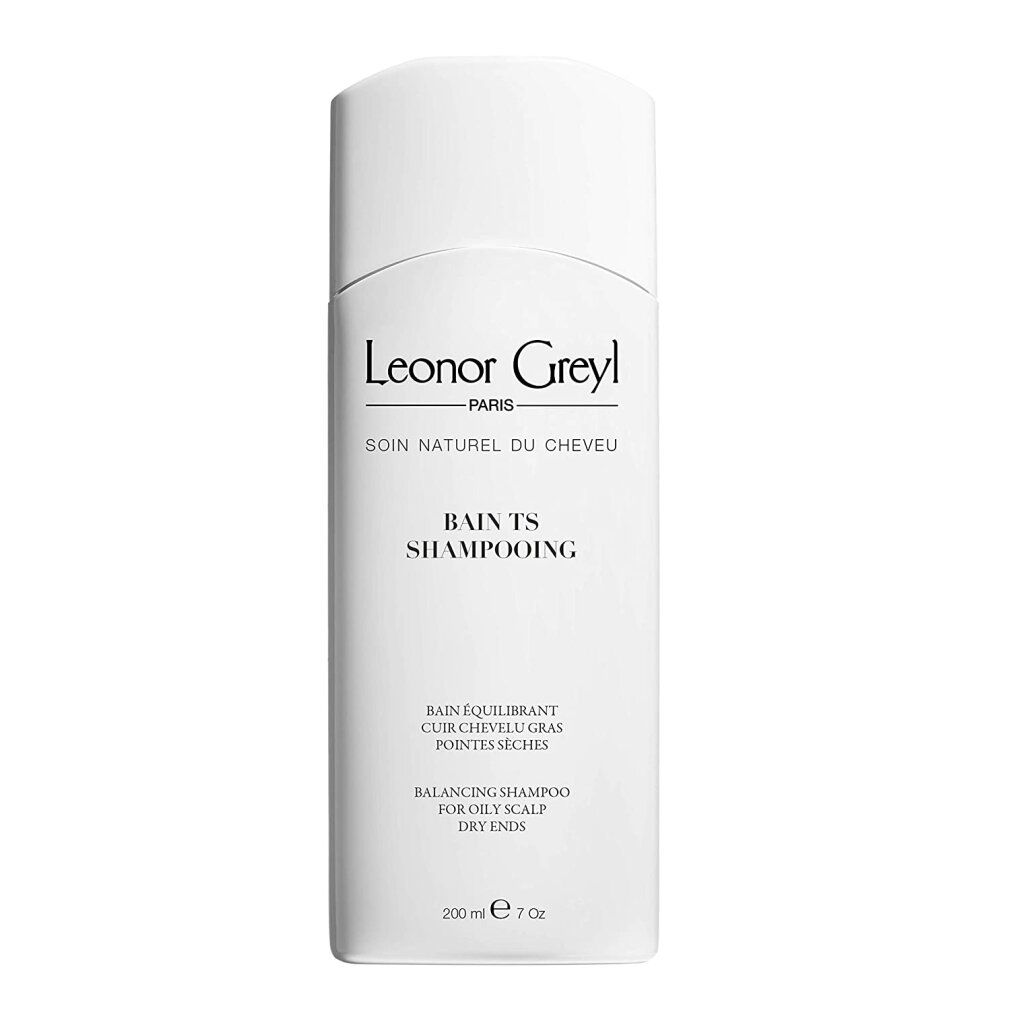 Shampoo bianco con testo. Scritta: Leonor Greyl Paris, Bain TS Shampooing. Per cuoio capelluto grasso e punte secche.